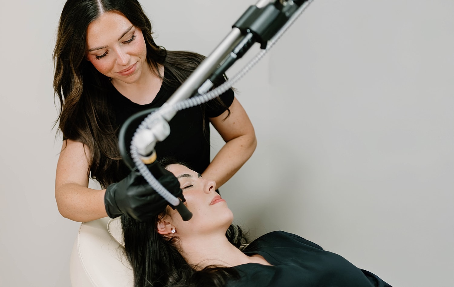 Skincare treatment session in a beauty clinic.