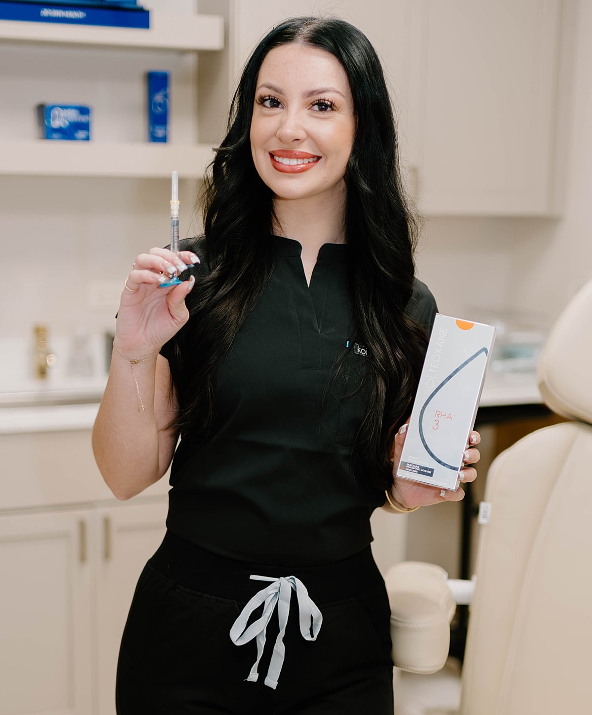 Professional showing skincare products and syringe.