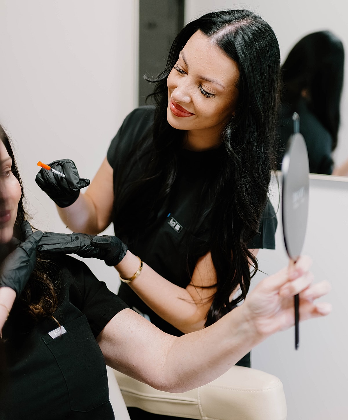 Beauty treatment session with professional and client.