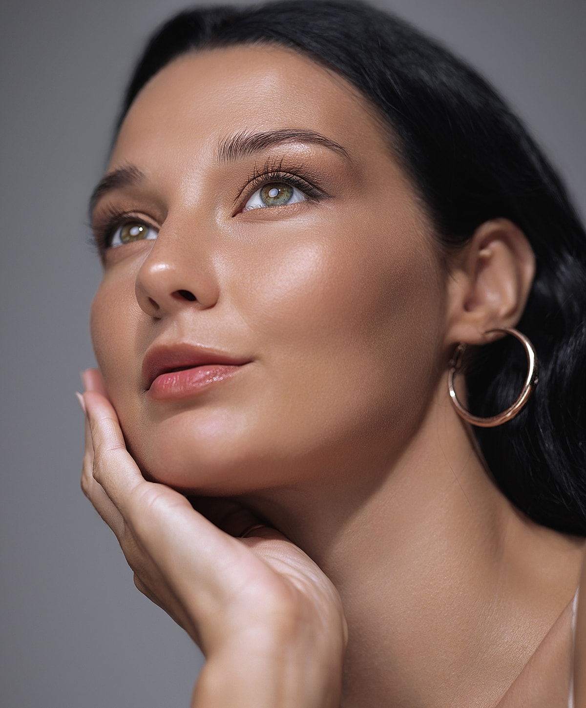 Close-up portrait of a woman with elegant features.