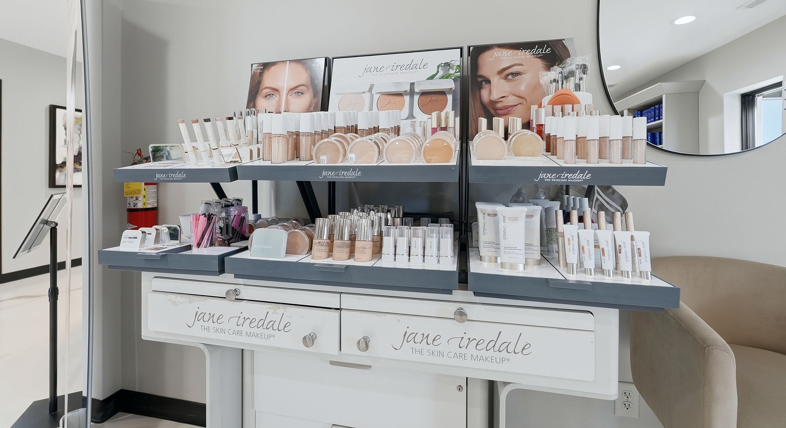 Jane Iredale skincare makeup display in a store.